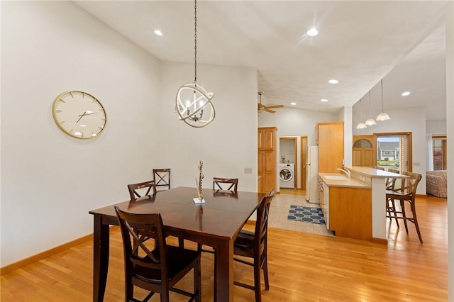 6 Windward Cir, Narragansett, RI 02882 - dining space featuring a chandelier, light wood-style floors, washer / dryer, recessed lighting, and baseboards