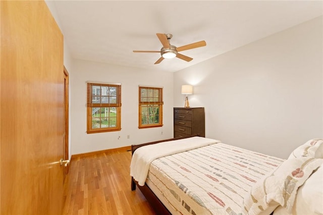 6 Windward Cir, Narragansett, RI 02882 - bedroom with light wood finished floors, baseboards, and ceiling fan