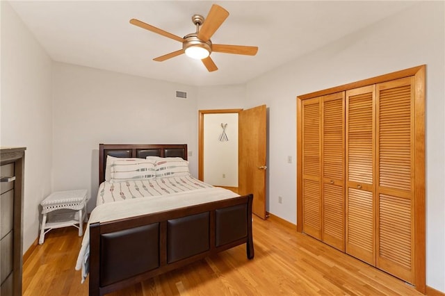 6 Windward Cir, Narragansett, RI 02882 - bedroom featuring light wood-style floors, a closet, a ceiling fan, and baseboards
