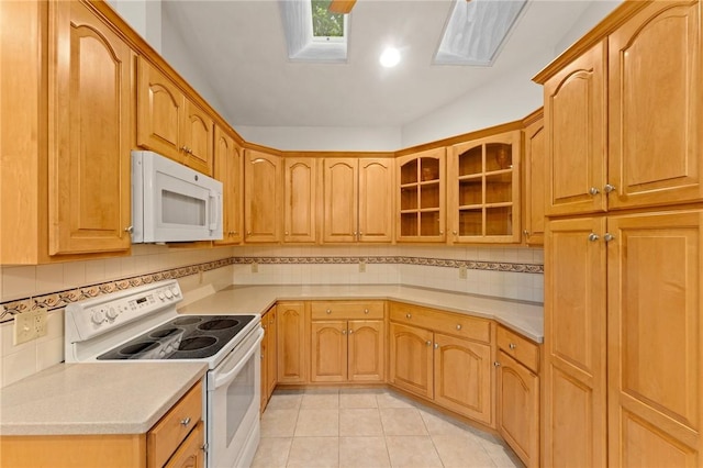 6 Windward Cir, Narragansett, RI 02882 - kitchen with white appliances, glass insert cabinets, backsplash, light tile patterned flooring, and light countertops