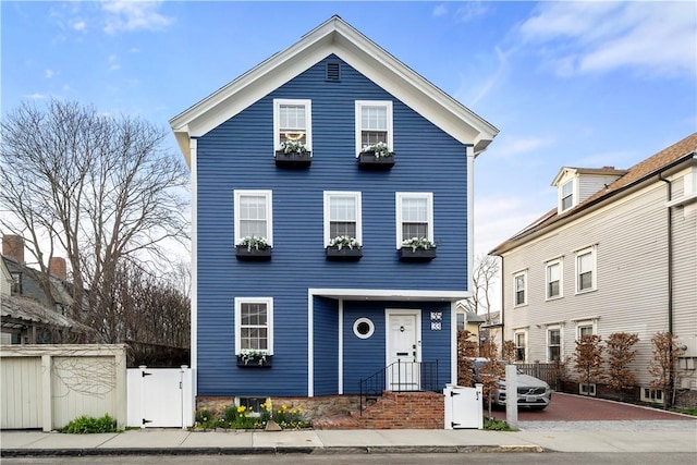33 Marsh St Unit 1, Newport, RI 02840 - view of front of house featuring fence and a gate