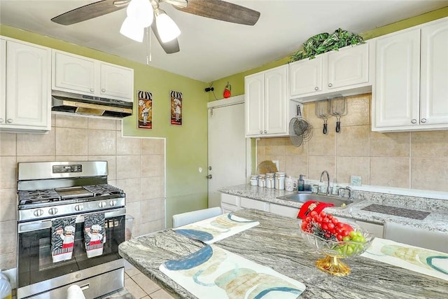 10 Westcott Ave Unit 3, Boston, MA 02124 - kitchen featuring stainless steel range with gas stovetop, under cabinet range hood, and white cabinetry