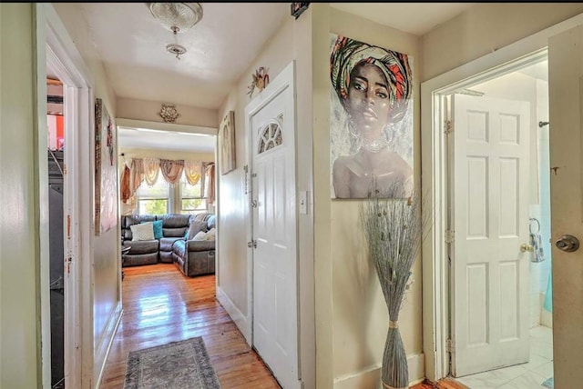10 Westcott Ave Unit 3, Boston, MA 02124 - hallway with light wood-style floors and baseboards