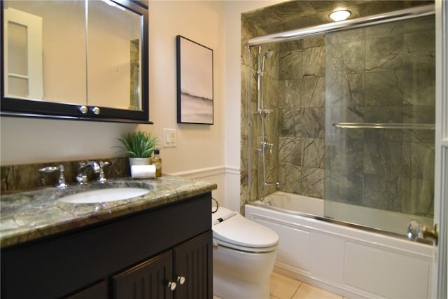 244 Kingstown Rd, Narragansett, RI 02882 - bathroom featuring toilet, shower / bath combination with glass door, and vanity