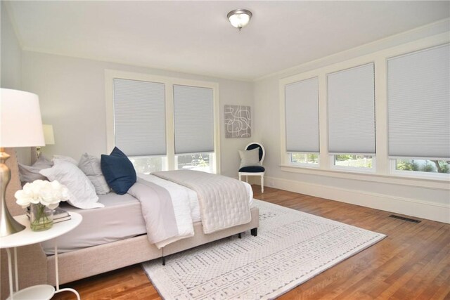 244 Kingstown Rd, Narragansett, RI 02882 - bedroom featuring wood finished floors and baseboards