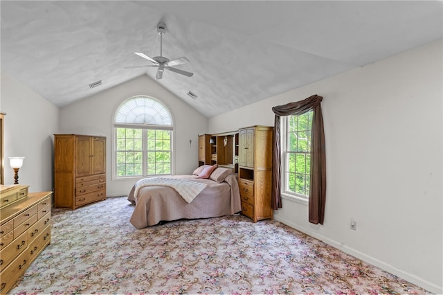 195 Deer Ridge Dr, North Kingstown, RI 02874 - carpeted bedroom featuring multiple windows, lofted ceiling, and ceiling fan