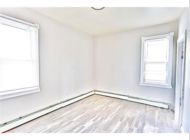 184 Wadsworth St, Providence, RI 02909 - spare room featuring healthy amount of natural light and wood finished floors