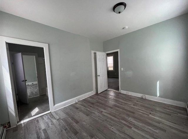 184 Wadsworth St, Providence, RI 02909 - unfurnished bedroom featuring wood finished floors and baseboards