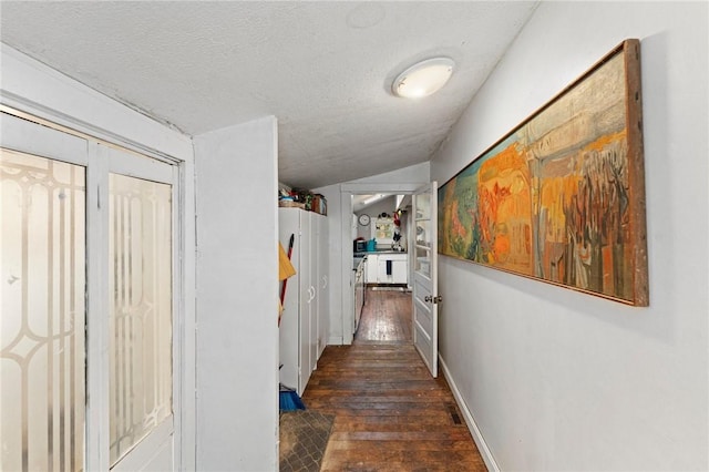 18 W St, Hopkinton, RI 02804 - hallway with hardwood / wood-style flooring, a textured ceiling, and baseboards