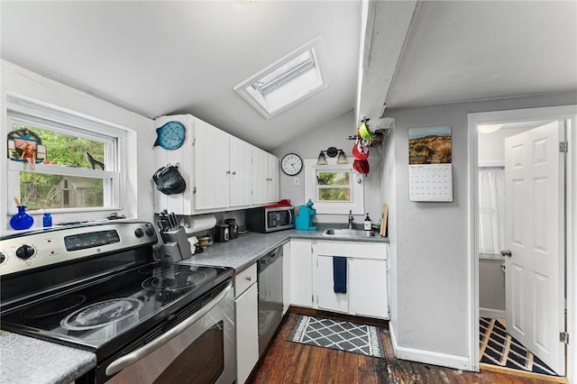 18 W St, Hopkinton, RI 02804 - kitchen with stainless steel appliances, a skylight, plenty of natural light, and a sink