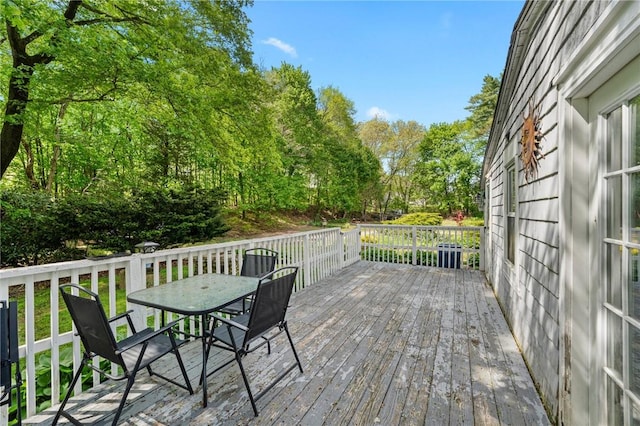 18 W St, Hopkinton, RI 02804 - wooden terrace featuring outdoor dining space and view of scattered trees
