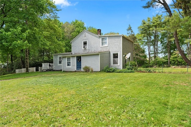 18 W St, Hopkinton, RI 02804 - back of house with a chimney, a lawn, and view of scattered trees