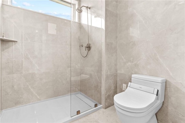 82 Ellery Rd, Newport, RI 02840 - bathroom featuring tiled shower, toilet, and tile walls