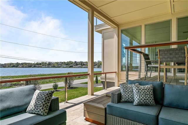 82 Ellery Rd, Newport, RI 02840 - sunroom with a water view and healthy amount of natural light