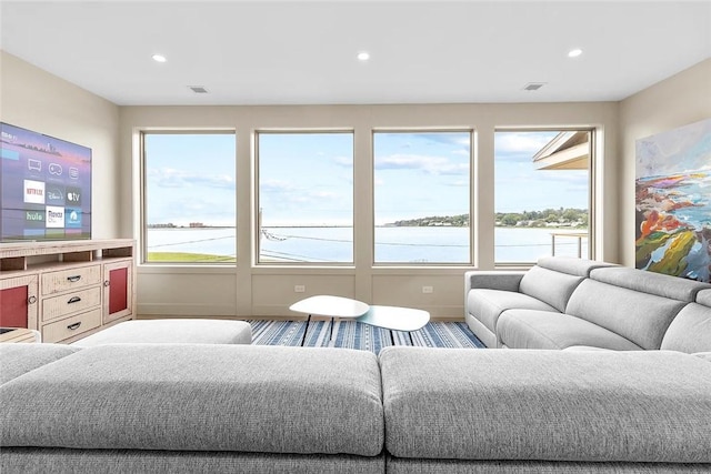 82 Ellery Rd, Newport, RI 02840 - living room with healthy amount of natural light, recessed lighting, and a water view