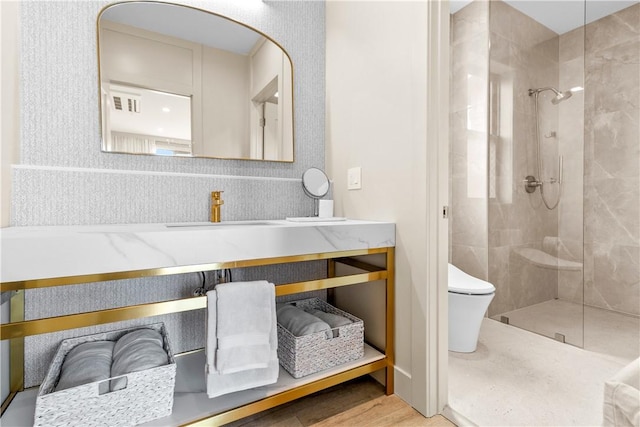 82 Ellery Rd, Newport, RI 02840 - full bathroom featuring tiled shower, toilet, vanity, and wood finished floors