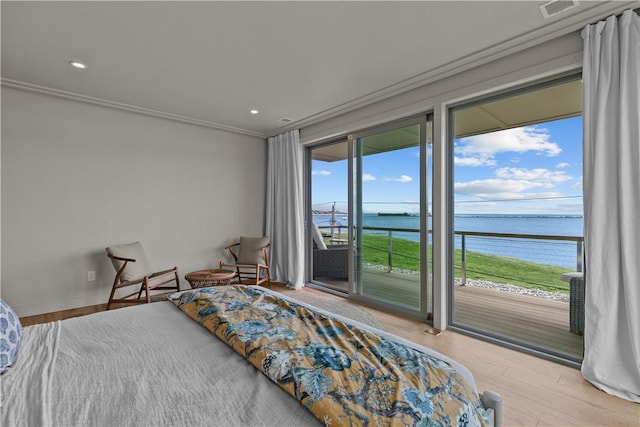 82 Ellery Rd, Newport, RI 02840 - bedroom with a water view, access to exterior, ornamental molding, and wood finished floors