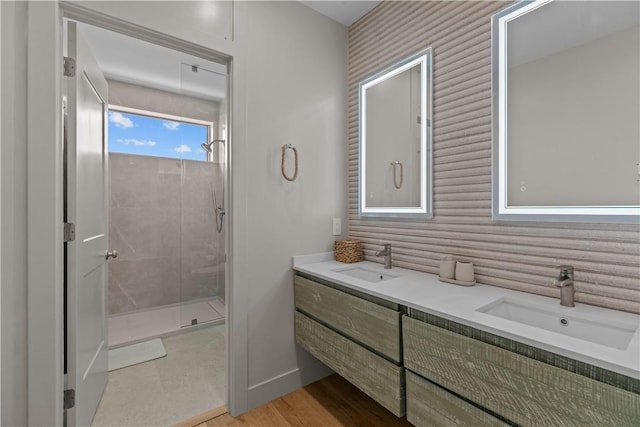 82 Ellery Rd, Newport, RI 02840 - full bath with a stall shower, double vanity, and baseboards
