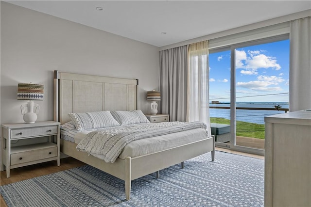 82 Ellery Rd, Newport, RI 02840 - bedroom featuring access to outside, dark wood finished floors, and a water view