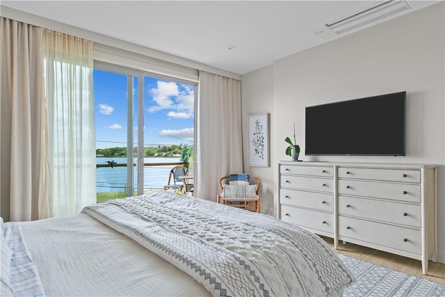 82 Ellery Rd, Newport, RI 02840 - bedroom featuring light wood-type flooring and access to exterior