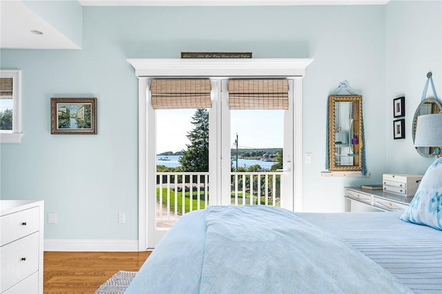 112 Avondale Rd, Westerly, RI 02891 - bedroom featuring wood finished floors, access to exterior, and baseboards