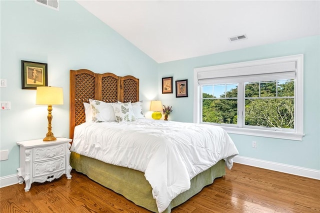 112 Avondale Rd, Westerly, RI 02891 - bedroom with baseboards, vaulted ceiling, and wood finished floors
