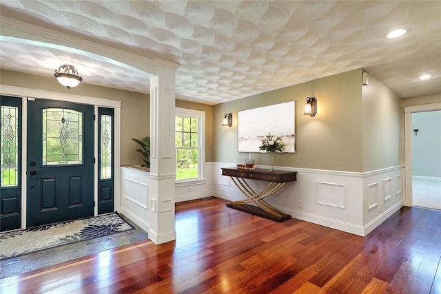 26 Old Richmond Townhouse Rd, Richmond, RI 02812 - entrance foyer featuring wood finished floors, wainscoting, recessed lighting, and decorative columns