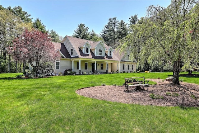 26 Old Richmond Townhouse Rd, Richmond, RI 02812 - cape cod-style house featuring a front lawn and covered porch