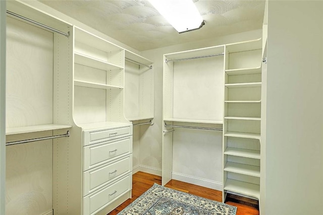 26 Old Richmond Townhouse Rd, Richmond, RI 02812 - walk in closet with dark wood finished floors