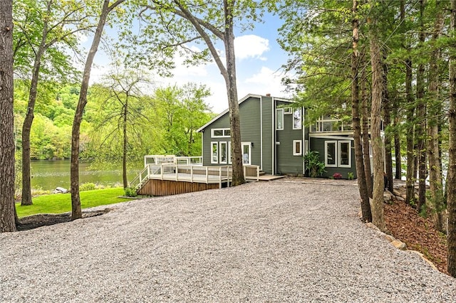 12 Hazel Point Rd, Smithfield, RI 02917 - view of front of house with a deck with water view