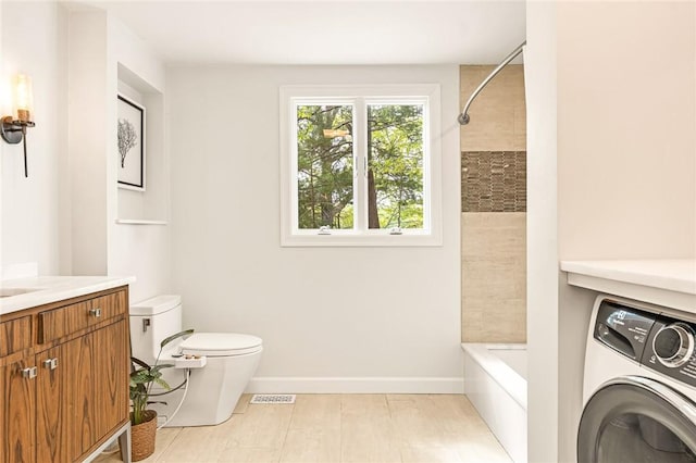 12 Hazel Point Rd, Smithfield, RI 02917 - full bath featuring washer / clothes dryer, toilet, baseboards, vanity, and bathtub / shower combination