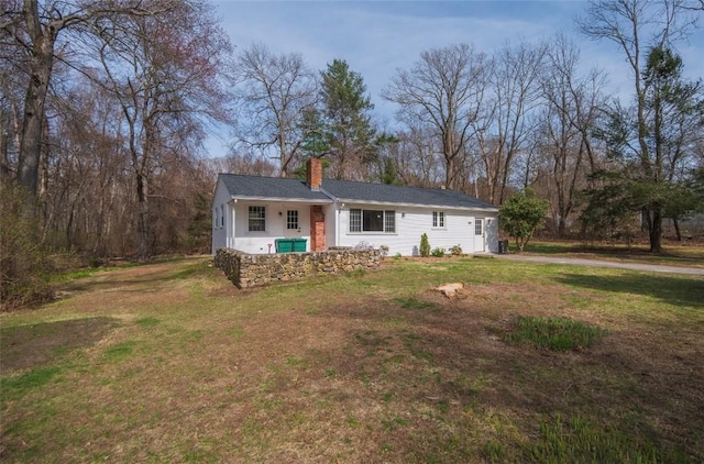 247 Quaker Ln, Scituate, RI 02857 - view of front of house featuring a chimney and a front yard