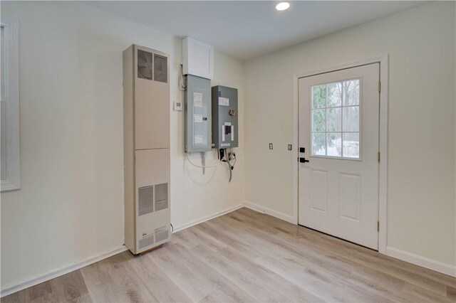 247 Quaker Ln, Scituate, RI 02857 - entrance foyer with a heating unit, light wood-style flooring, recessed lighting, and baseboards