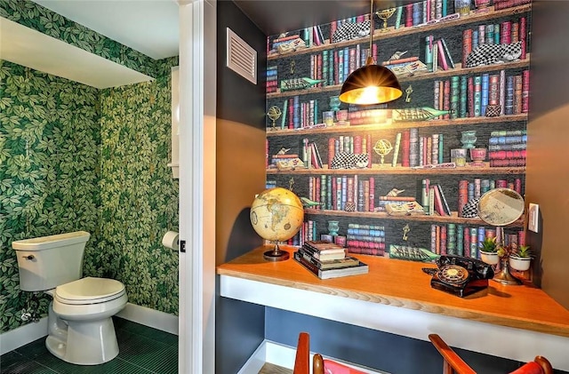 detailed view of wallpapered walls and baseboards