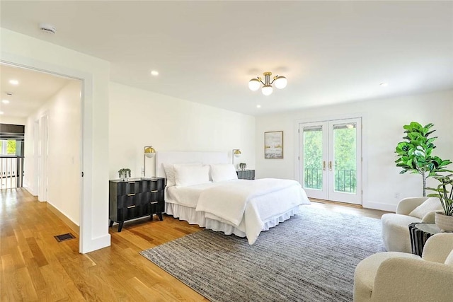 bedroom featuring french doors, access to outside, light wood-type flooring, recessed lighting, and baseboards