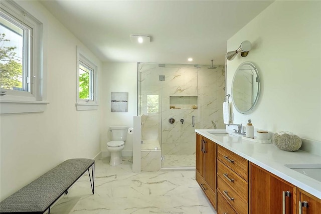 bathroom with toilet, a marble finish shower, marble finish flooring, double vanity, and recessed lighting