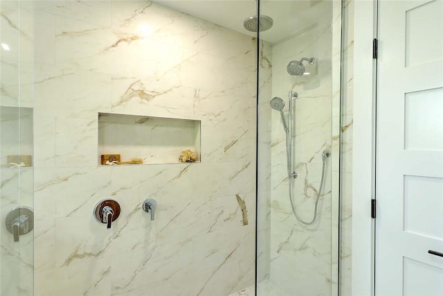full bath with a marble finish shower