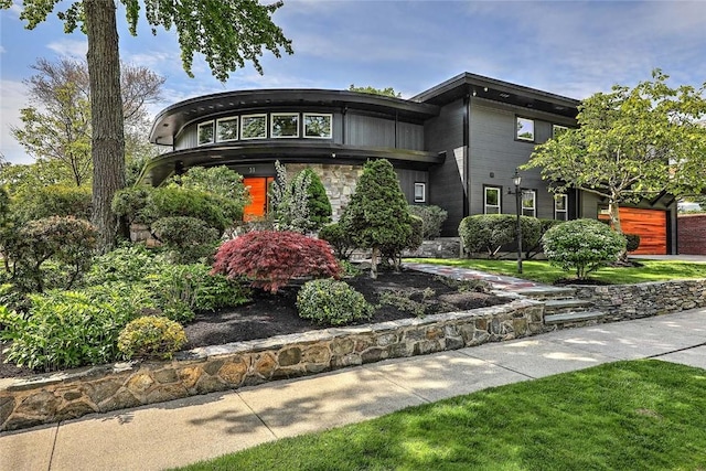 view of front facade featuring stone siding