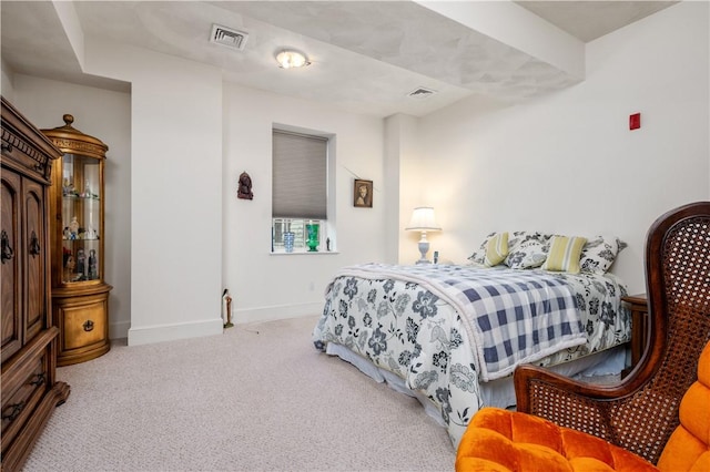 carpeted bedroom featuring baseboards