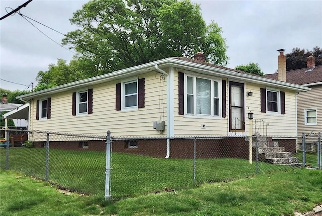 211 Iroquois Rd, Cumberland, RI 02864 - view of front of house featuring a chimney