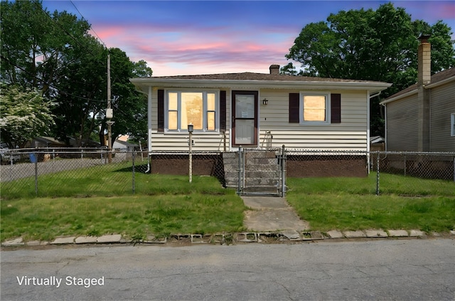 211 Iroquois Rd, Cumberland, RI 02864 - view of front facade with a gate, a fenced front yard, and a chimney