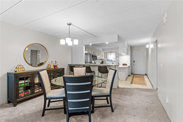143 Hoffman Ave Unit 210, Cranston, RI 02920 - dining space with light colored carpet