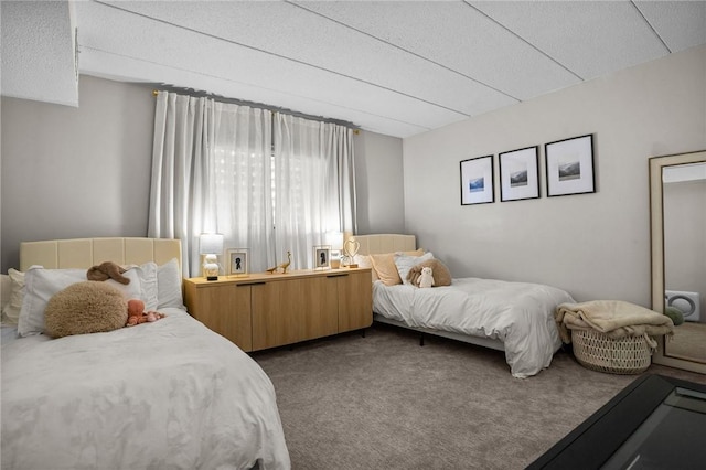 143 Hoffman Ave Unit 210, Cranston, RI 02920 - carpeted bedroom with a textured ceiling