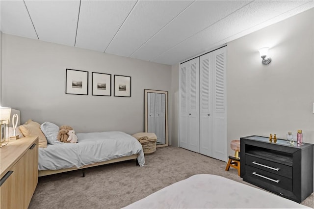 143 Hoffman Ave Unit 210, Cranston, RI 02920 - bedroom featuring light carpet and a closet