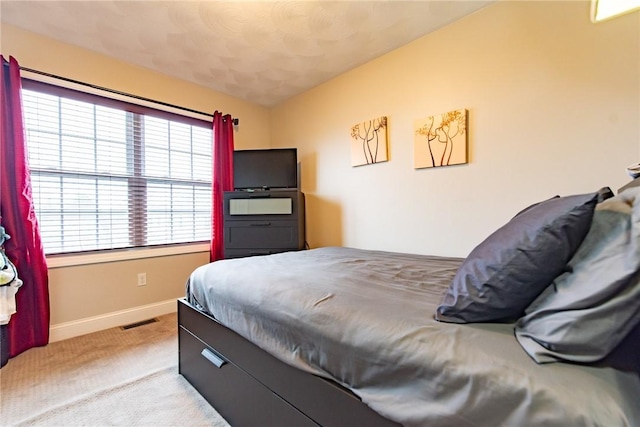 10 Flanders St, Johnston, RI 02919 - bedroom featuring light carpet and baseboards