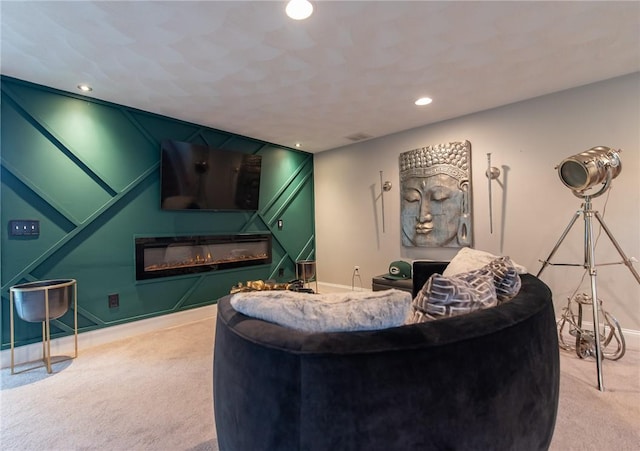 10 Flanders St, Johnston, RI 02919 - living room featuring carpet, a glass covered fireplace, baseboards, and recessed lighting