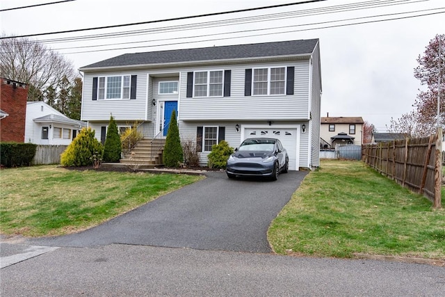 10 Flanders St, Johnston, RI 02919 - split foyer home featuring driveway and an attached garage