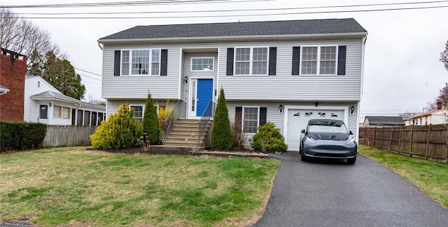 10 Flanders St, Johnston, RI 02919 - raised ranch with a garage and driveway