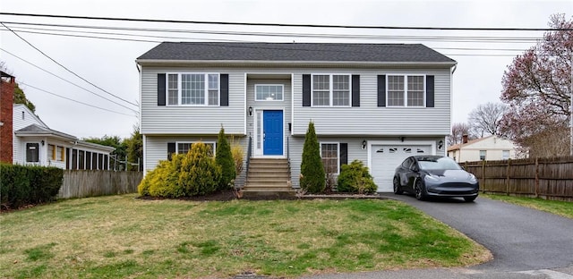 10 Flanders St, Johnston, RI 02919 - raised ranch featuring driveway and an attached garage