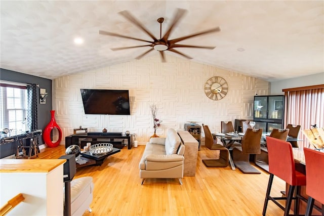 10 Flanders St, Johnston, RI 02919 - living room with a ceiling fan, lofted ceiling, wood finished floors, and baseboards